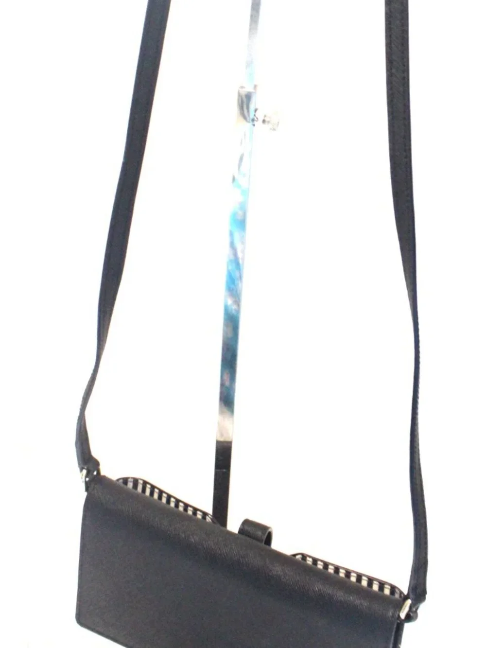 The Kate Spade Bifold Wallet/Crossbody in Black Saffiano Leather is a stylish an